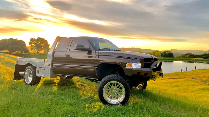 This is how you take photos to advertise a truck - in a green field close to heaven.